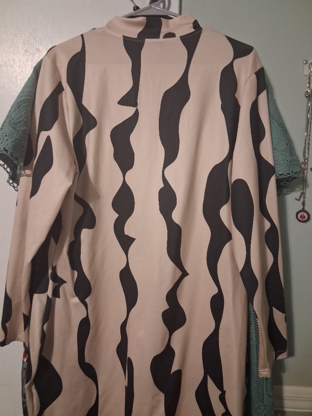 Beige and black dress